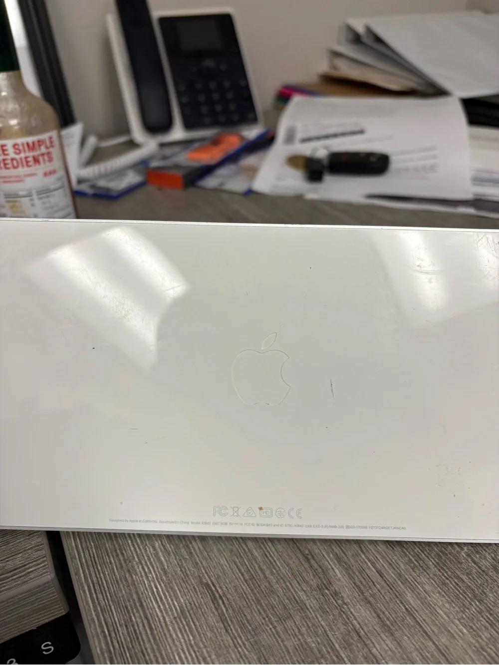 Apple Magic Keyboard in Silver and White lightning cable